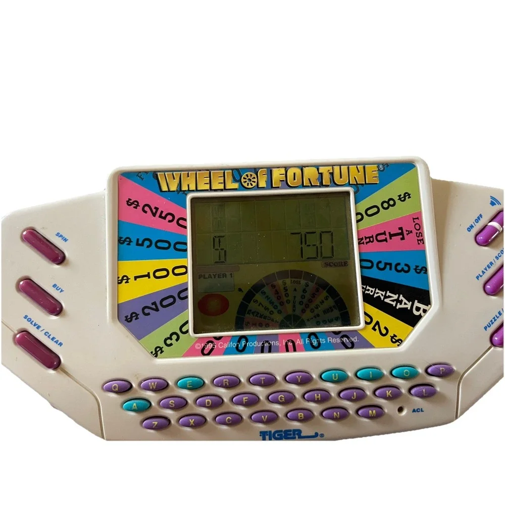 Vintage Tiger Electronics Wheel of Fortune Handheld Game Fun Family Working 1995
